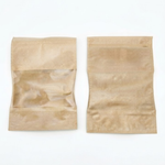 Deux sachets kraft avec fenêtre transparente et fermeture zip, vus de face sur fond blanc