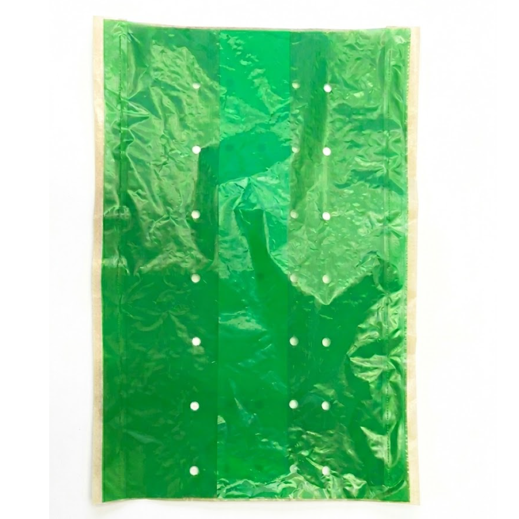 Présentation d'une garniture en matière kraft et plastique perforée pour plateau 60x40