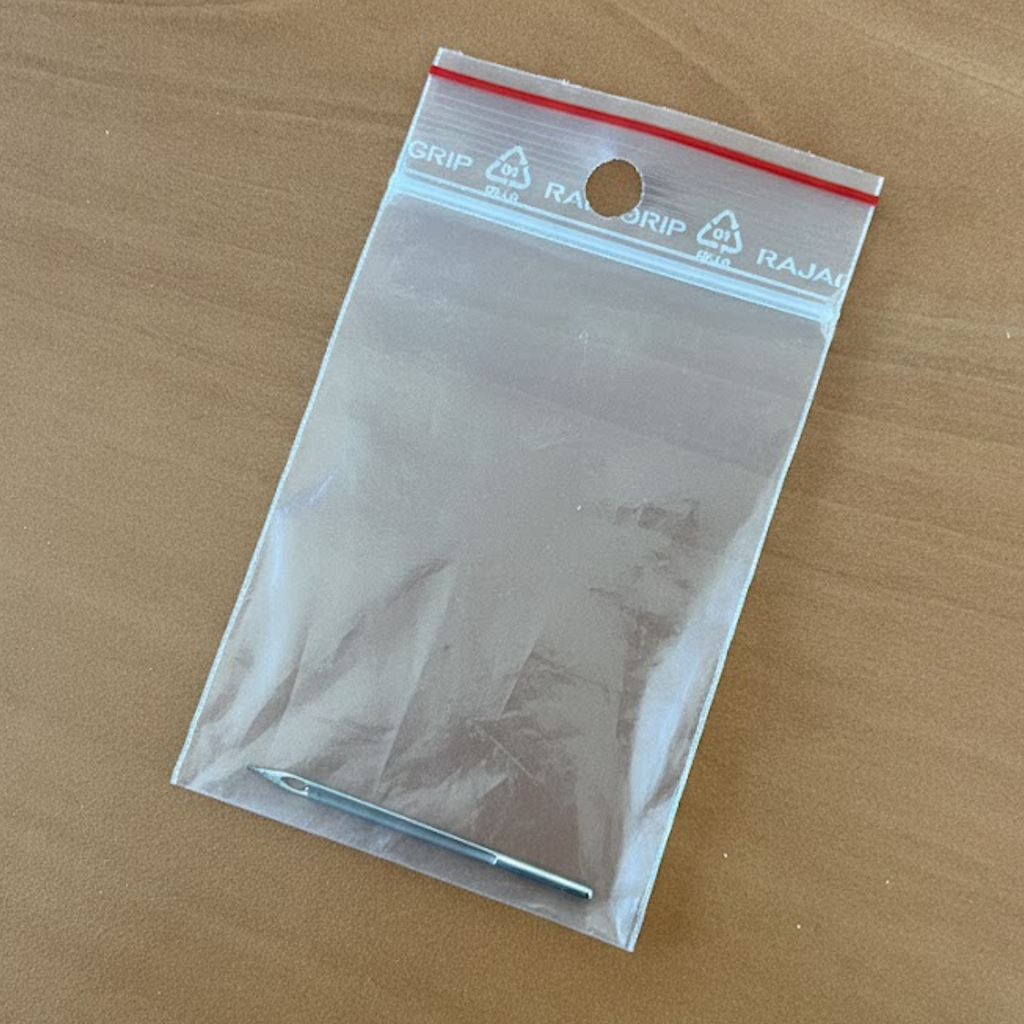 Démonstration de l'utilisation du produit Aiguille D5 RP sur fond neutre