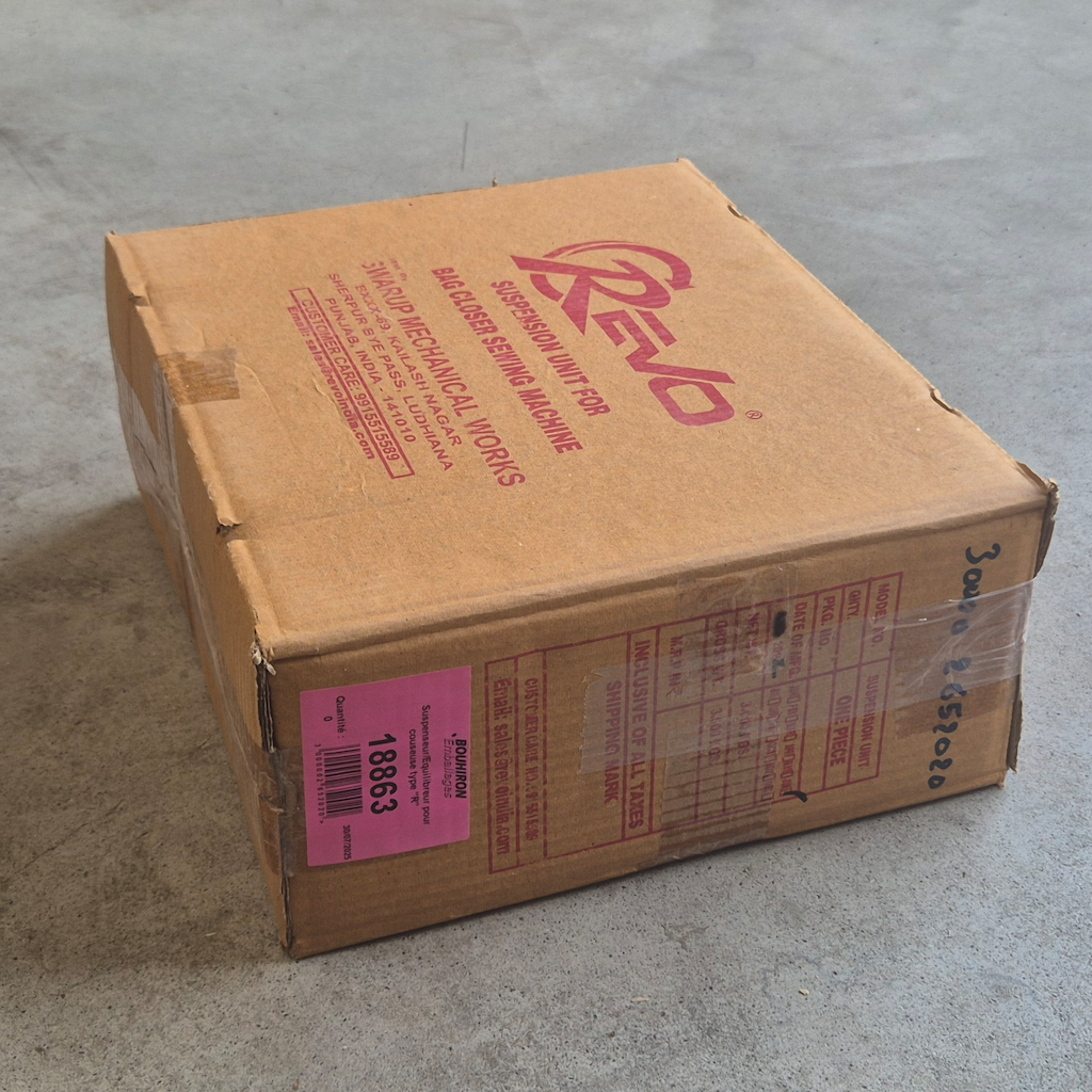 Présentation du colisage reçu pour le produit Suspenseur/Equilibreur pour couseuse type ''R''