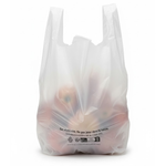 Démonstration de l'utilisation du produit Sac Bretelles réutilisables Blanc 26+12x45cm 50µ /10L sur fond neutre